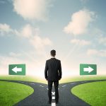 Planning business transitions - image of Businessman in front of a choice